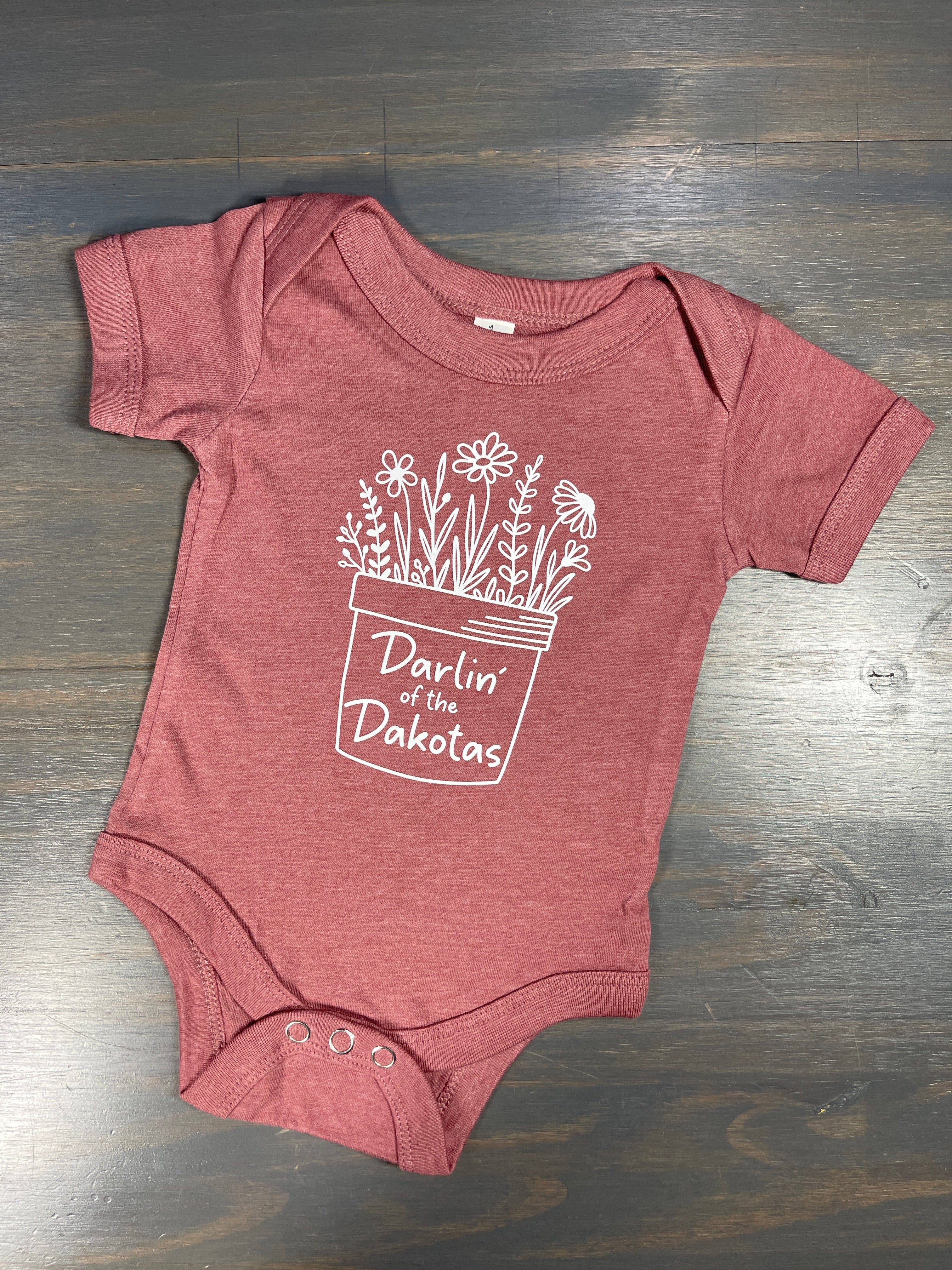 Darlin' of the Dakotas Onesie